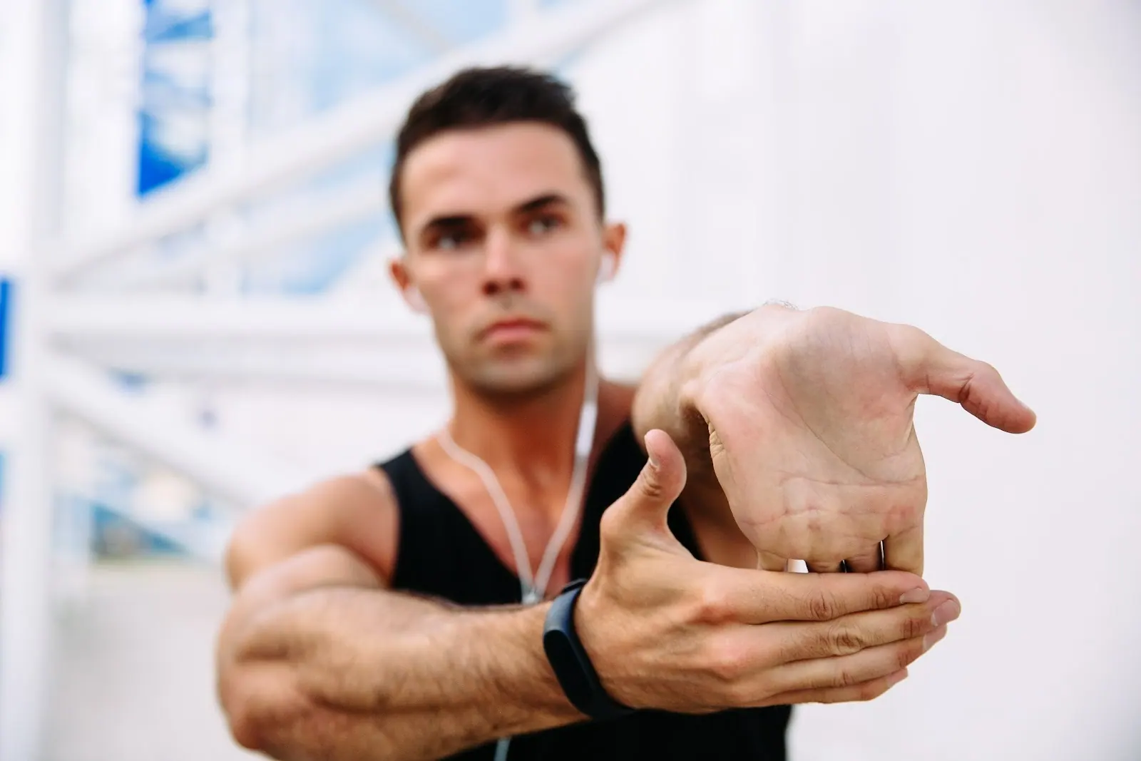 Man stretching his wrist and forearm