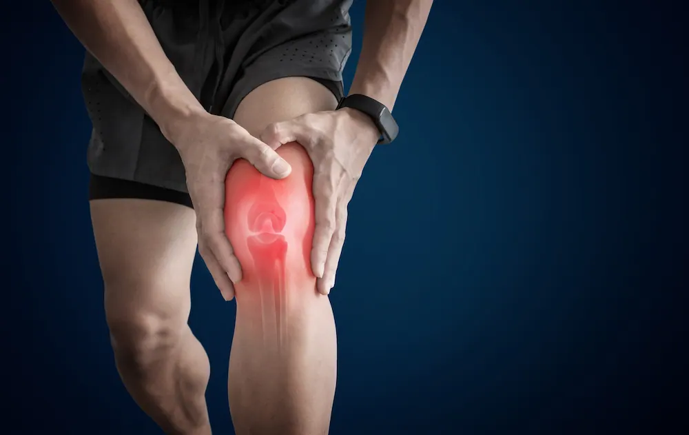 athlete man suffer from overuse knee pain