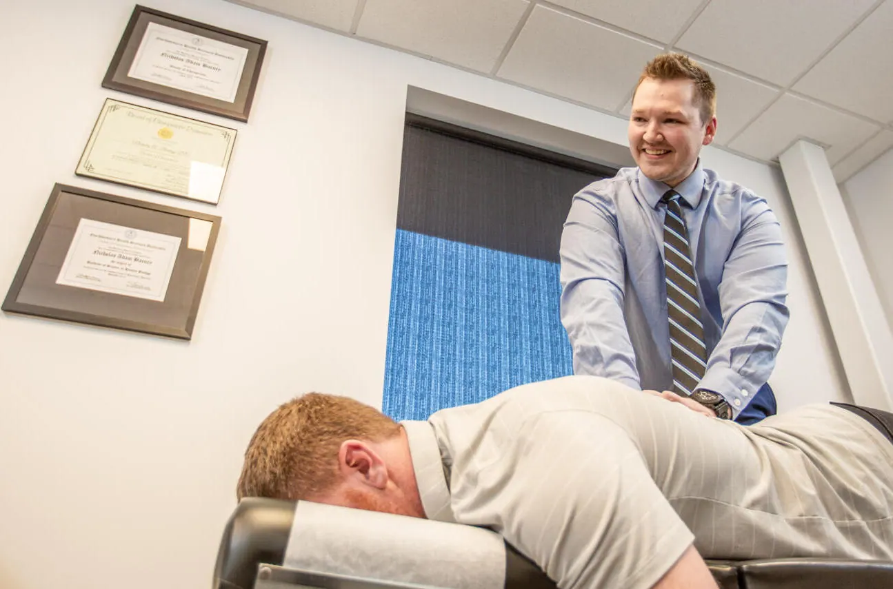 Dr. Barney attend patients pinched nerve treatment