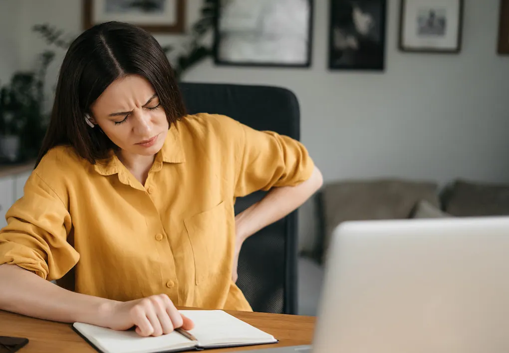 woman suffer from sciatica due to poor posture